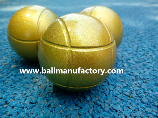 Metal boules ball in golden color